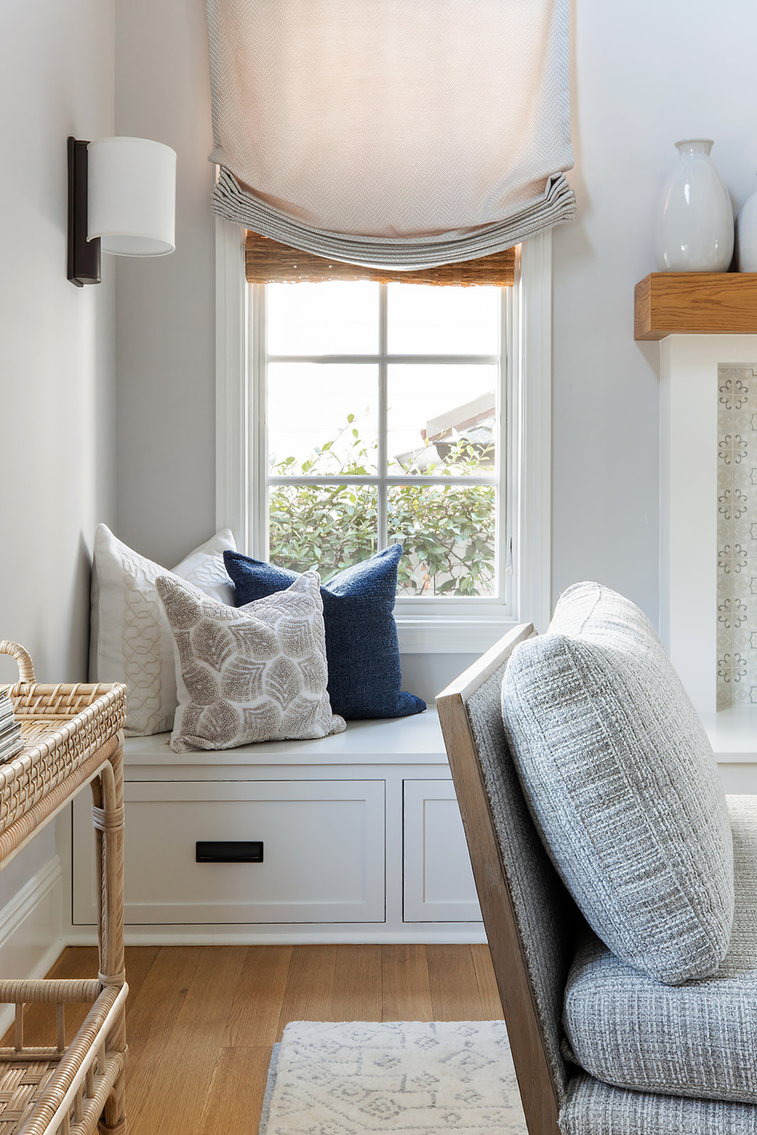 Sofa set pillows and small shelf add a classy touch in interior design