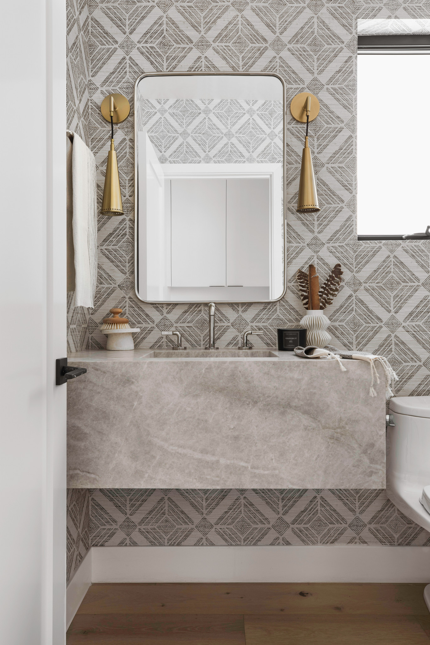 Bathroom design with marble sink and cabinet