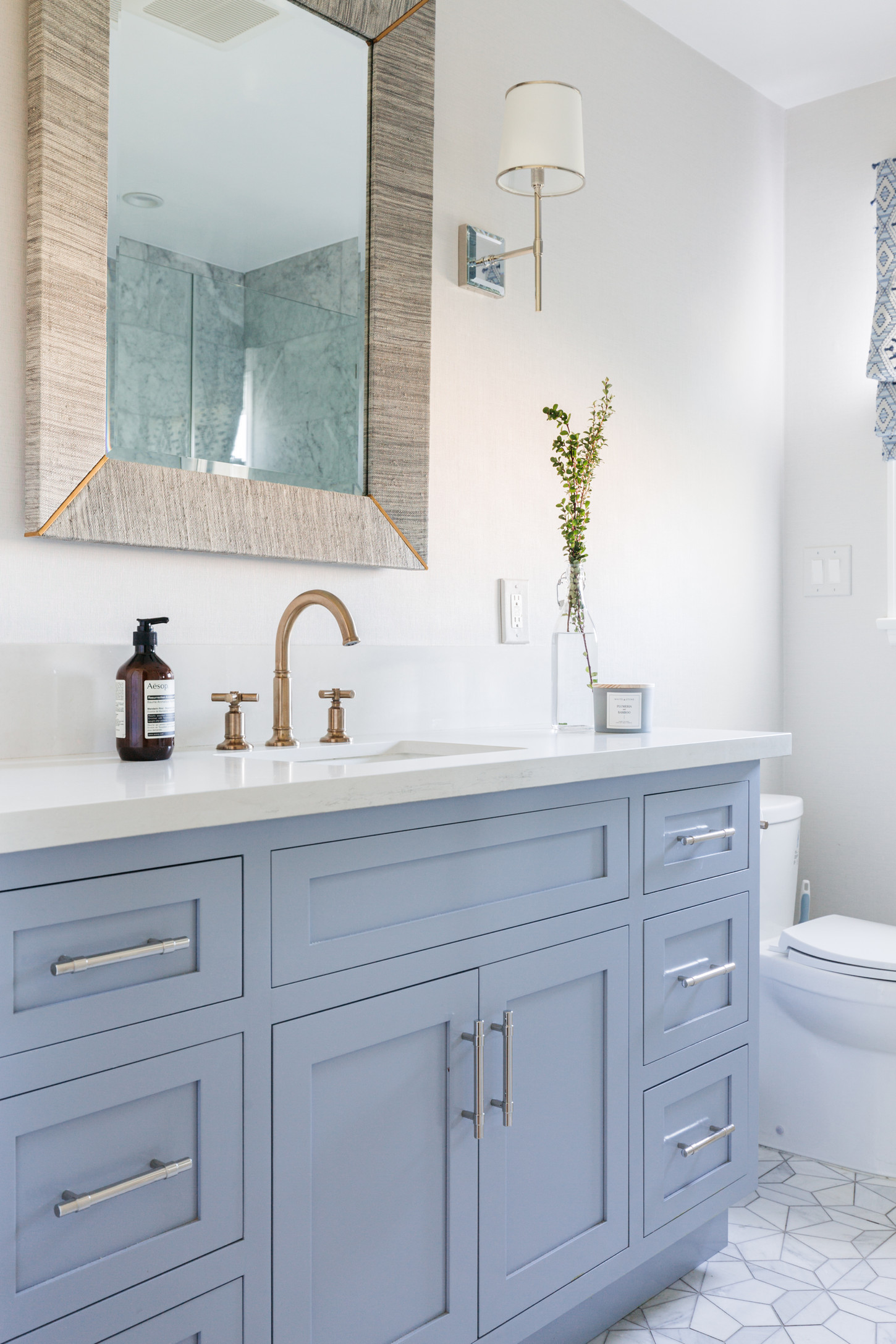 Bathroom interiors with mirrors and storage cabinets