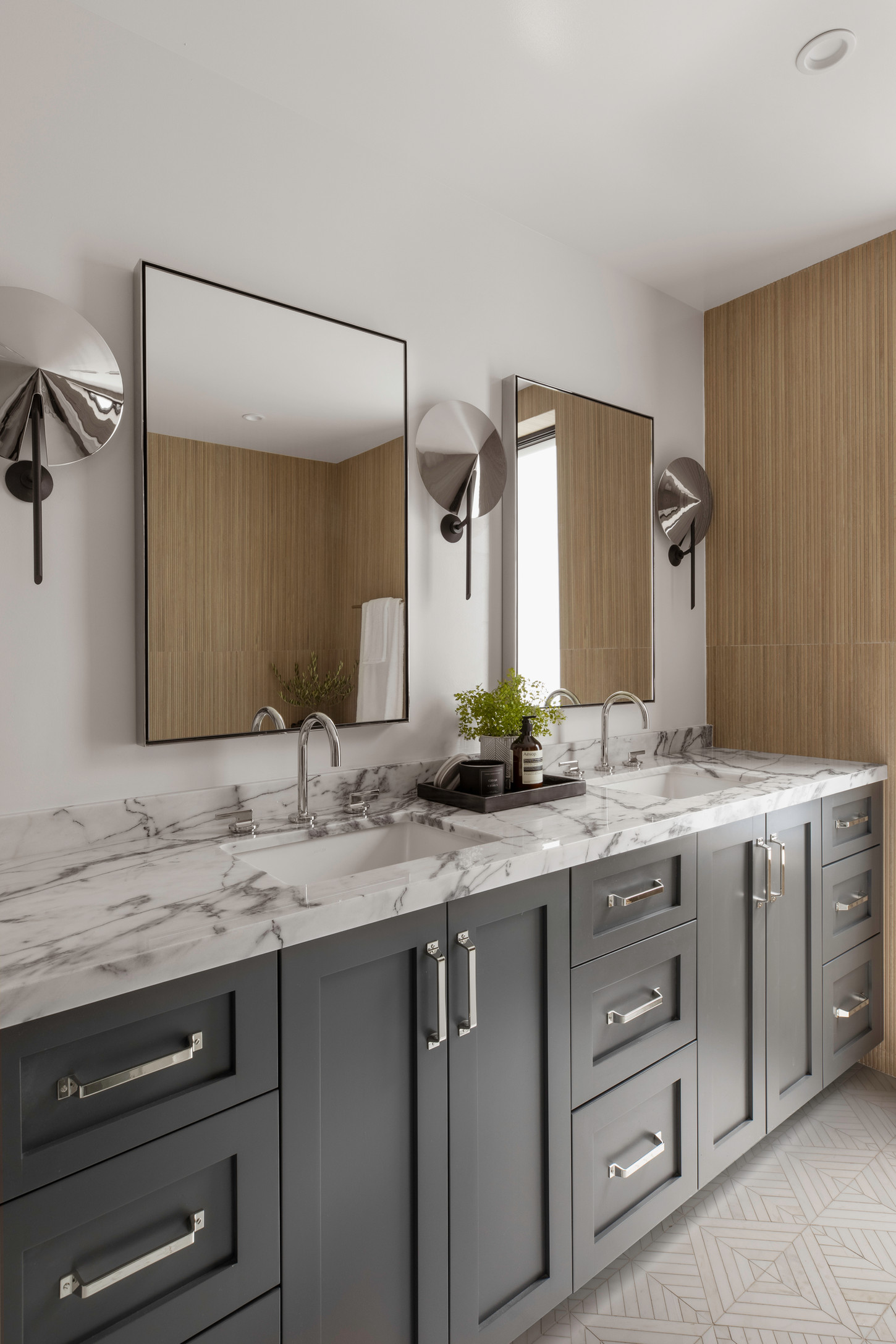 Modern kitchen with aesthetic storage cabinets and mirror