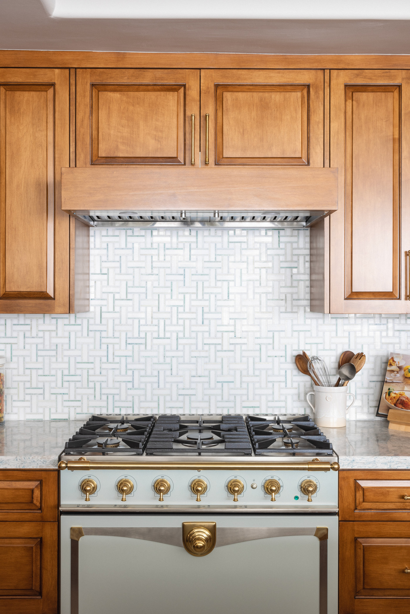 Kitchen design with stainless steel oven and storage box